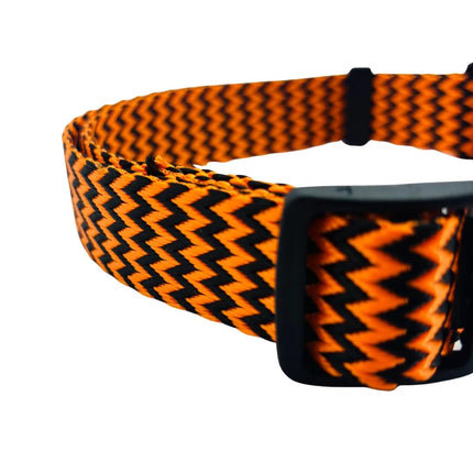 Orange black patterned dog collar with secure leash attachment ring