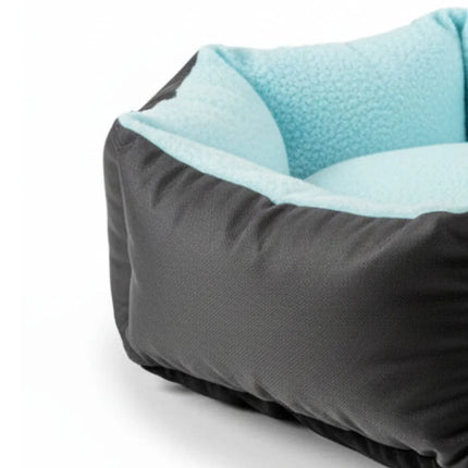 Round pet bed with high bolster walls – secure and comfortable for pets